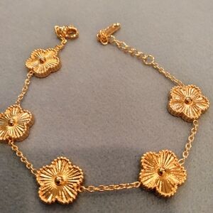 Crazy  deal flower clover bracelet gold plated Looks for less. Last One